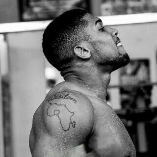 Anthony Joshua Honors Late Coaches With Tattoo Tribute After Tragic Lagos-Ibadan Crash